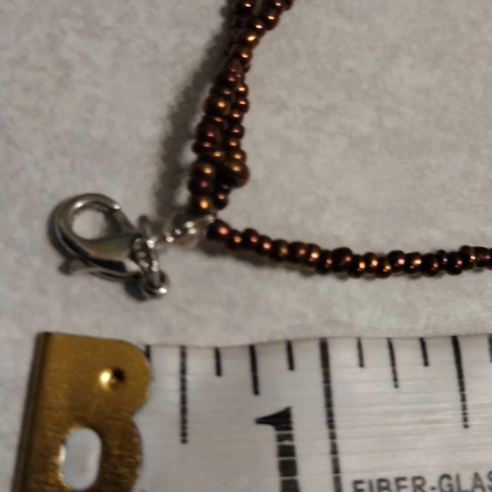 Beautiful triple strands of shell's and beads necklace. - Picture 3 of 4